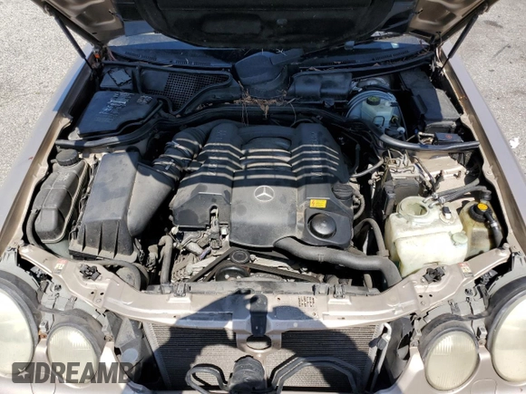 2000 Mercedes-Benz E-Class AWD with VIN WDBJH82J8YX042547, listed as a Copart auction lot 58063494 with 138,392 mi miles and Salvage Title. Bid and sale history available at carsss.com. Image 11.
