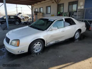 2000 Cadillac DeVille with VIN 1G6KD54Y2YU272566, listed as a Copart auction lot 70886454 with 152,690 mi miles and Salvage Title. Bid and sale history available at carsss.com. Image 1.