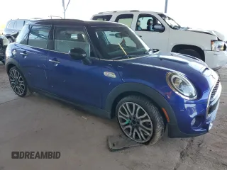 2019 MINI Hardtop 4 Door Cooper S z VIN WMWXU3C58K2H55626, wystawiony jako Copart lot #54404175 z przebiegiem 65 209 mil mil oraz Szkoda całkowita • Salvage title. Historia ofert i sprzedaży dostępna na DreamBid. Obrazek 4.