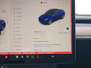 2023 Tesla Model Y Long Range z VIN 7SAYGDEE0PF840787, wystawiony jako IAAI lot #42172489 z przebiegiem 16 314 mil mil oraz . Historia ofert i sprzedaży dostępna na DreamBid. Obrazek 16.