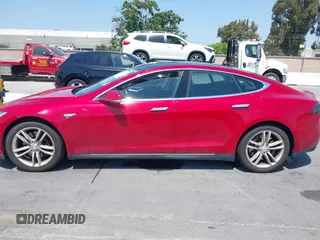 2014 Tesla Model S 60 with VIN 5YJSA1S11EFP33278, listed as a IAAI auction lot 42441781 with Not provided miles and . Bid and sale history available at DreamBid. Image 14.