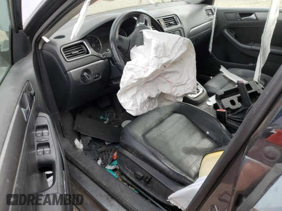 2014 Volkswagen Jetta SEL z VIN 3VWL17AJ9EM441590, wystawiony jako Copart lot #50995785 z przebiegiem Nie podano mil oraz Szkoda całkowita • Salvage title. Historia ofert i sprzedaży dostępna na DreamBid. Obrazek 8.