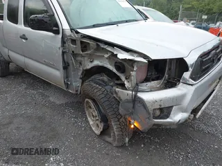 2012 Toyota Tacoma with VIN 5TFUX4EN2CX011263, listed as a IAAI auction lot 42670078 with 164,922 mi miles and . Bid and sale history available at DreamBid. Image 6.