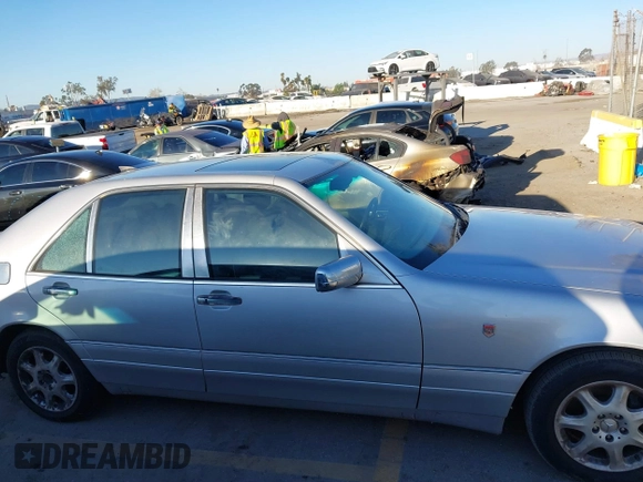 1996 Mercedes-Benz S 320 with VIN WDBGA32E9TA307279, listed as a IAAI auction lot 41631747 with 189,048 mi miles and . Bid and sale history available at DreamBid. Image 13.