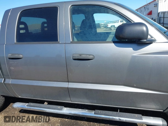 2005 Dodge Dakota SLT with VIN 1D7HW48N25S133725, listed as a IAAI auction lot 42074588 with 163,090 mi miles. Bid and sale history available at carsss.com. Image 13.