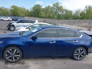 2017 Nissan Altima SV with VIN 1N4AL3AP0HC278809, listed as a IAAI auction lot 42087711 with 113,676 mi miles and . Bid and sale history available at DreamBid. Image 14.