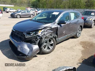 2019 Honda CR-V LX with VIN 2HKRW5H32KH410676, listed as a IAAI auction lot 42038654 with 94,342 mi miles. Bid and sale history available at carsss.com. Image 17.