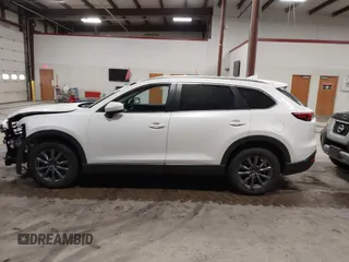 2022 Mazda CX-9 Sport z VIN JM3TCBBYXN0603653, wystawiony jako IAAI lot #42325893 z przebiegiem 57 480 mil mil oraz . Historia ofert i sprzedaży dostępna na DreamBid. Obrazek 14.