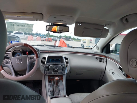 2012 Buick LaCrosse Premium 1 z VIN 1G4GD5E30CF116878, wystawiony jako IAAI lot #42209045 z przebiegiem 129 074 mil mil oraz . Historia ofert i sprzedaży dostępna na DreamBid. Obrazek 15.