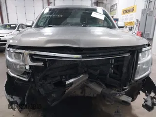 2018 Chevrolet Suburban Premier z VIN 1GNSKJKC9JR100134, wystawiony jako IAAI lot #41449255 z przebiegiem 111 528 mil mil oraz . Historia ofert i sprzedaży dostępna na DreamBid. Obrazek 12.