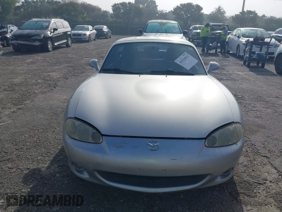 2003 Mazda MX-5 Miata Cloth with VIN JM1NB353730311899, listed as a IAAI auction lot 41929811 with 99,589 mi miles and . Bid and sale history available at DreamBid. Image 12.