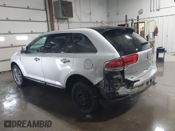 2014 Lincoln MKX with VIN 2LMDJ8JK7EBL16661, listed as a IAAI auction lot 41595967 with 77,868 mi miles. Bid and sale history available at carsss.com. Image 3.