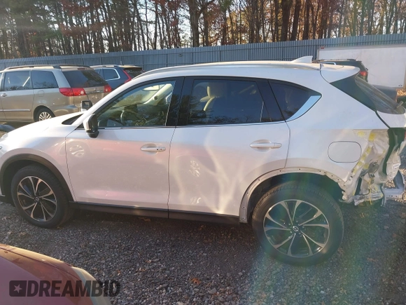 2023 Mazda CX-5 2.5 S Premium Plus Package with VIN JM3KFBEM2P0244281, listed as a IAAI auction lot 40820295 with 10,886 mi miles. Bid and sale history available at carsss.com. Image 14.