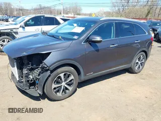 2018 Kia Sorento EX with VIN 5XYPHDA57JG388378, listed as a IAAI auction lot 41977584 with 121,482 mi miles and . Bid and sale history available at carsss.com. Image 2.