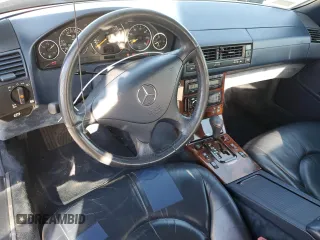 1999 Mercedes-Benz SL-Class with VIN WDBFA68F3XF183399, listed as a Copart auction lot 76908024 with 136,337 mi miles and Salvage Title. Bid and sale history available at carsss.com. Image 8.
