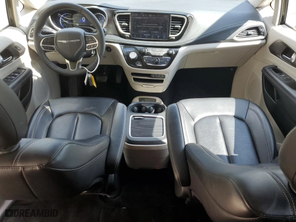 2023 Chrysler Pacifica Hybrid Touring L with VIN 2C4RC1L74PR631346, listed as a Copart auction lot 48480975 with 50,937 mi miles and Clean Title. Bid and sale history available at carsss.com. Image 8.