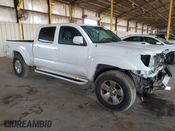 2005 Toyota Tacoma PreRunner with VIN 3TMKU72N15M003377, listed as a Copart auction lot 58870615 with 235,816 mi miles and Salvage title. Bid and sale history available at DreamBid. Image 4.