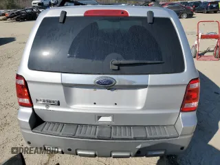 2010 Ford Escape Limited with VIN 1FMCU0E71AKC71285, listed as a Copart auction lot 61344164 with 163,471 mi miles and Salvage title. Bid and sale history available at DreamBid. Image 6.