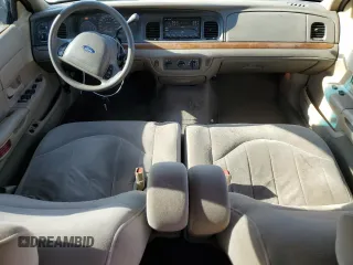 2002 Ford Crown Victoria Standard с VIN 2FAFP73WX2X103936, выставлен на аукционе Copart как лот 67688374 с пробегом 161 511 миль миль и Списание • Salvage title. История ставок и продаж доступна на DreamBid. Изображение 8.