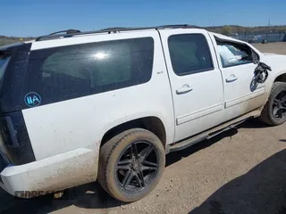 2013 GMC Yukon XL SLT z VIN 1GKS2KE77DR326758, wystawiony jako IAAI lot #41851754 z przebiegiem 144 976 mil mil oraz . Historia ofert i sprzedaży dostępna na DreamBid. Obrazek 4.