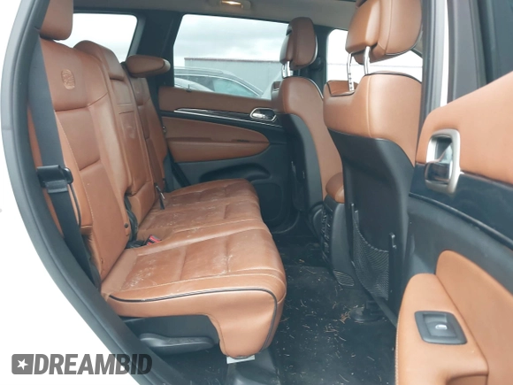 2013 Jeep Grand Cherokee Overland with VIN 1C4RJFCT4DC640553, listed as a IAAI auction lot 41311413 with 146,212 mi miles. Bid and sale history available at carsss.com. Image 8.