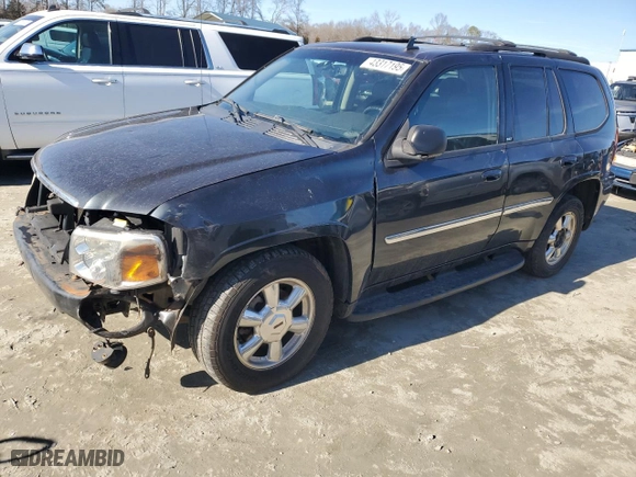 2006 GMC Envoy SLE with VIN 1GKDT13S462129176, listed as a Copart auction lot 43317195 with 227,844 mi miles and Salvage Title. Bid and sale history available at carsss.com. Image 1.
