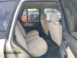 2005 GMC Envoy SLT with VIN 1GKDS13S452141376, listed as a IAAI auction lot 42095025 with 198,911 mi miles and . Bid and sale history available at DreamBid. Image 8.