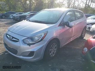2014 Hyundai Accent GS with VIN KMHCT5AE4EU159319, listed as a IAAI auction lot 41896989 with 204,453 mi miles. Bid and sale history available at carsss.com. Image 2.