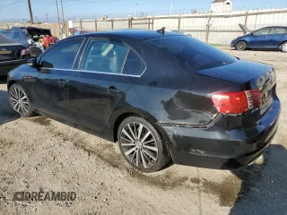2014 Volkswagen Jetta SE z VIN 3VWD17AJXEM374051, wystawiony jako Copart lot #50261485 z przebiegiem 138 282 mil mil oraz Szkoda całkowita • Salvage title. Historia ofert i sprzedaży dostępna na DreamBid. Obrazek 2.