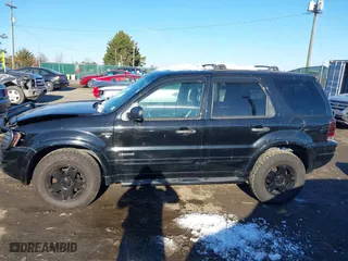 2002 Ford Escape Limited with VIN 1FMCU041X2KC74197, listed as a IAAI auction lot 41363369 with 153,704 mi miles. Bid and sale history available at carsss.com. Image 14.