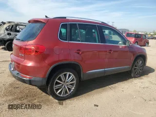 2014 Volkswagen Tiguan SE with VIN WVGAV3AX9EW038118, listed as a Copart auction lot 56329625 with 134,620 mi miles and Salvage title. Bid and sale history available at DreamBid. Image 3.