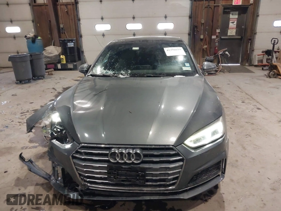 2018 Audi A5 Premium Plus with VIN WAUTNAF50JA011354, listed as a IAAI auction lot 41396659 with 74,936 mi miles and . Bid and sale history available at DreamBid. Image 12.