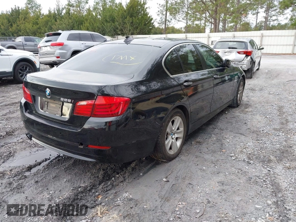2012 BMW 5 Series 528i with VIN WBAXG5C51CDY28325, listed as a IAAI auction lot 41348221 with 125,039 mi miles. Bid and sale history available at carsss.com. Image 4.