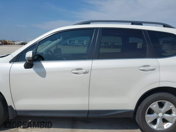 2014 Subaru Forester Touring with VIN JF2SJAMC9EH497673, listed as a IAAI auction lot 42481068 with 174,882 mi miles and . Bid and sale history available at DreamBid. Image 14.