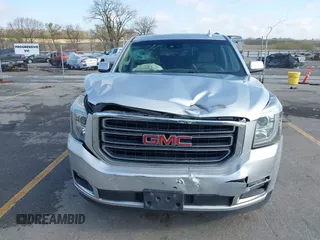 2015 GMC Yukon XL SLT z VIN 1GKS2HKCXFR618783, wystawiony jako IAAI lot #42081053 z przebiegiem 230 368 mil mil oraz . Historia ofert i sprzedaży dostępna na DreamBid. Obrazek 13.