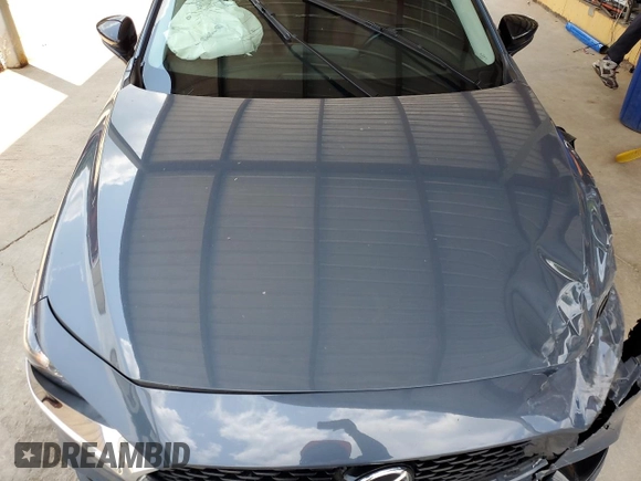 2022 Mazda 3 Carbon Edition with VIN 3MZBPACL0NM318475, listed as a Copart auction lot 59286455 with 27,327 mi miles and Salvage title. Bid and sale history available at DreamBid. Image 11.