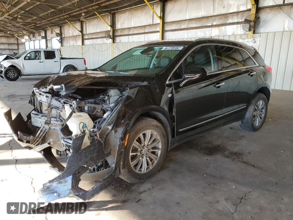 2017 Cadillac XT5 Luxury FWD z VIN 1GYKNBRS0HZ230262, wystawiony jako Copart lot #79557274 z przebiegiem 46 831 mil mil oraz Tytuł czysty. Historia ofert i sprzedaży dostępna na DreamBid. Obrazek 1.