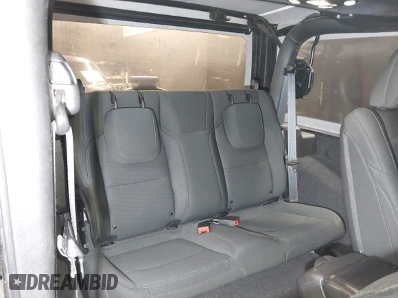 2021 Jeep Wrangler Sport S with VIN 1C4HJXAG2MW502452, listed as a IAAI auction lot 42031159 with 87,952 mi miles and . Bid and sale history available at DreamBid. Image 8.