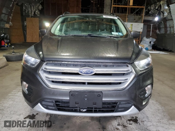 2018 Ford Escape SE z VIN 1FMCU9GD7JUA68705, wystawiony jako Copart lot #58275145 z przebiegiem 200 695 mil mil oraz Tytuł czysty. Historia ofert i sprzedaży dostępna na DreamBid. Obrazek 5.