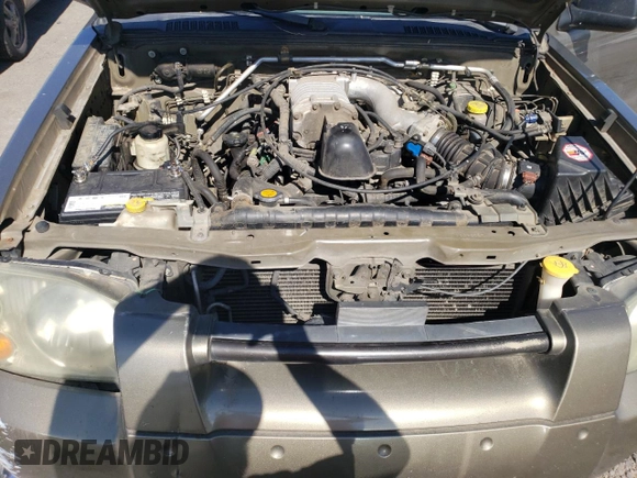 2002 Nissan Frontier SVE with VIN 1N6MD27Y82C392057, listed as a Copart auction lot 63640405 with 167,092 mi miles and Clean title. Bid and sale history available at DreamBid. Image 11.
