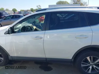 2017 Toyota RAV4 XLE with VIN JTMWFREV8HD107495, listed as a IAAI auction lot 41859546 with 150,503 mi miles and . Bid and sale history available at DreamBid. Image 14.