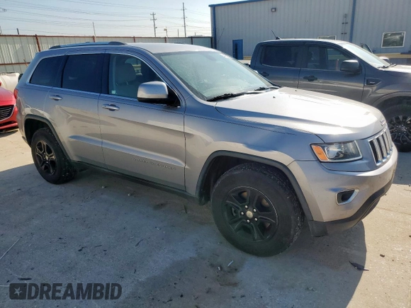 2014 Jeep Grand Cherokee Laredo with VIN 1C4RJEAG4EC182773, listed as a Copart auction lot 54085255 with 138,775 mi miles and Salvage Title. Bid and sale history available at DreamBid. Image 4.