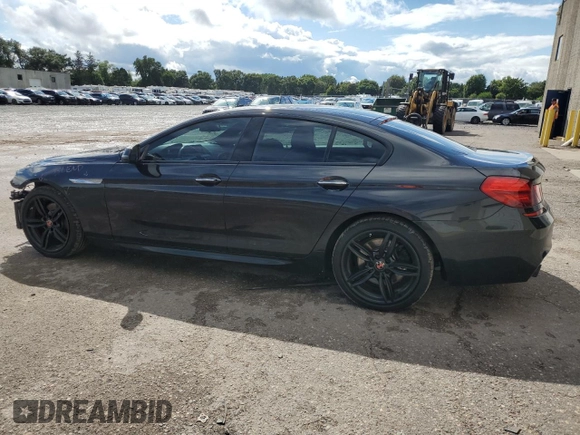2017 BMW 6 Series z VIN WBA6D2C31HGT73273, wystawiony jako Copart lot #67705734 z przebiegiem 75 080 mil mil oraz Szkoda całkowita • Salvage title. Historia ofert i sprzedaży dostępna na DreamBid. Obrazek 2.