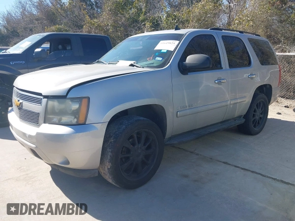 2007 Chevrolet Tahoe LT z VIN 1GNFC13077R105182, wystawiony jako IAAI lot #41649825 z przebiegiem Nie podano mil oraz . Historia ofert i sprzedaży dostępna na DreamBid. Obrazek 2.