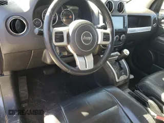 2015 Jeep Compass High Altitude Edition with VIN 1C4NJCEA2FD297487, listed as a Copart auction lot 46445255 with 124,986 mi miles and Clean Title. Bid and sale history available at carsss.com. Image 8.