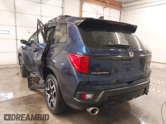 2022 Honda Passport Elite z VIN 5FNYF8H05NB013145, wystawiony jako IAAI lot #41355097 z przebiegiem 45 615 mil mil oraz . Historia ofert i sprzedaży dostępna na DreamBid. Obrazek 3.