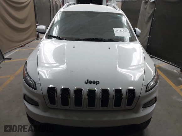 2016 Jeep Cherokee Altitude with VIN 1C4PJLCB7GW342904, listed as a IAAI auction lot 42281323 with 124,309 mi miles and . Bid and sale history available at DreamBid. Image 6.