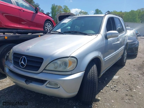 2004 Mercedes-Benz M-Class 3.5L with VIN 4JGAB57E34A499577, listed as a IAAI auction lot 41997422 with 117,623 mi miles. Bid and sale history available at carsss.com. Image 2.