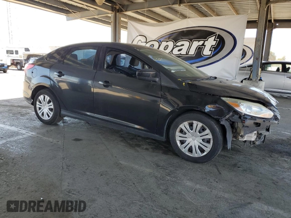 2012 Ford Focus SE with VIN 1FAHP3F25CL293041, listed as a Copart auction lot 58069955 with 127,129 mi miles and Salvage title. Bid and sale history available at DreamBid. Image 4.