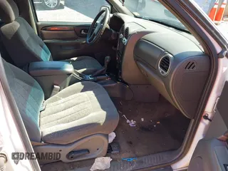 2004 GMC Envoy SLE with VIN 1GKDT13S442223832, listed as a IAAI auction lot 41845628 with 265,898 mi miles. Bid and sale history available at carsss.com. Image 5.
